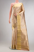 Pure Silk Pure Zari Rose Gold Dual Tone Kanjivaram Tissue Saree with Zari Brocade on the body and Zari Border.  displayed on a mannequin