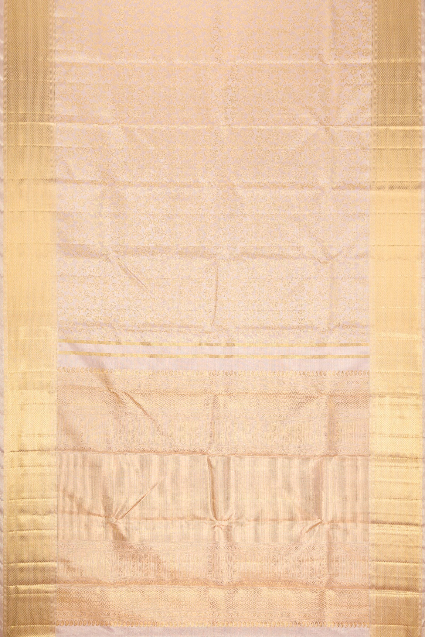 Flat view of Pure Silk Pure Zari Rose Gold Dual Tone Kanjivaram Tissue Saree with Zari Brocade on the body and Zari Border. 
