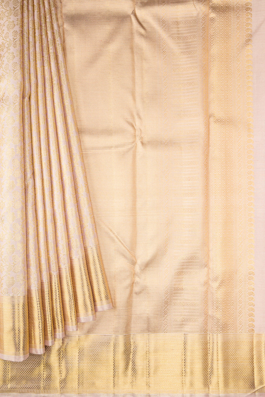 Pleats and pallu of Pure Silk Pure Zari Rose Gold Dual Tone Kanjivaram Tissue Saree with Zari Brocade on the body and Zari Border. 