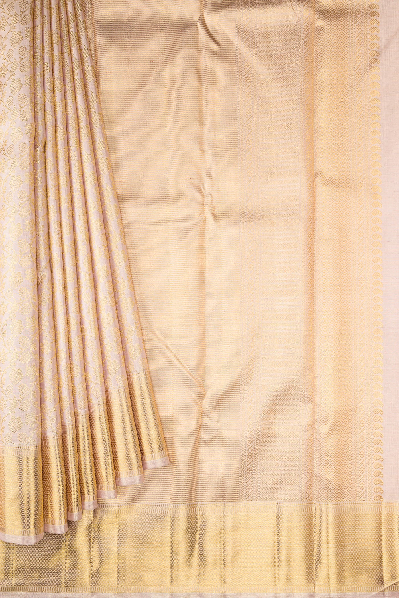 Pleats and pallu of Pure Silk Pure Zari Rose Gold Dual Tone Kanjivaram Tissue Saree with Zari Brocade on the body and Zari Border. 