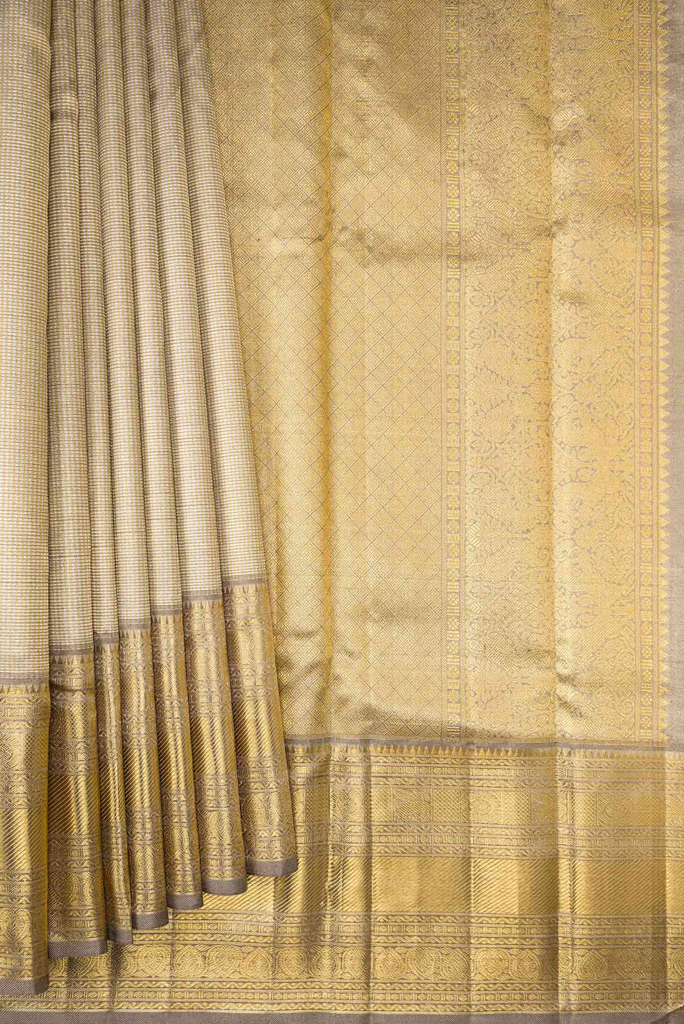 Pleats and pallu of Pure Silk Pure Zari Grey Dual Tone Kanjivaram Tissue Saree with Zari Brocade on the body and Zari Border. 