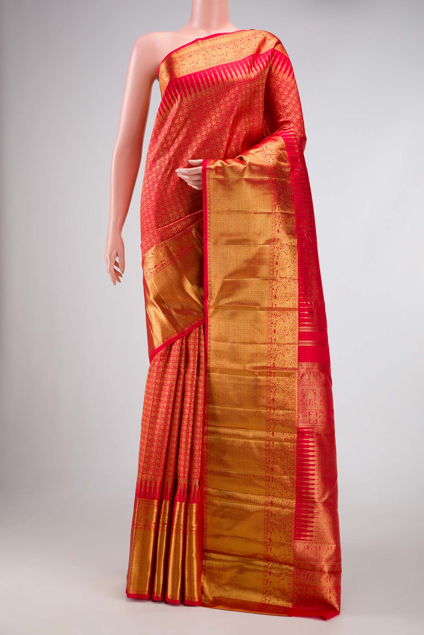 Pure Silk Pure Zari Red Dual Tone Kanchipuram Saree with Zari Brocade on the body and Zari Border displayed on a mannequin