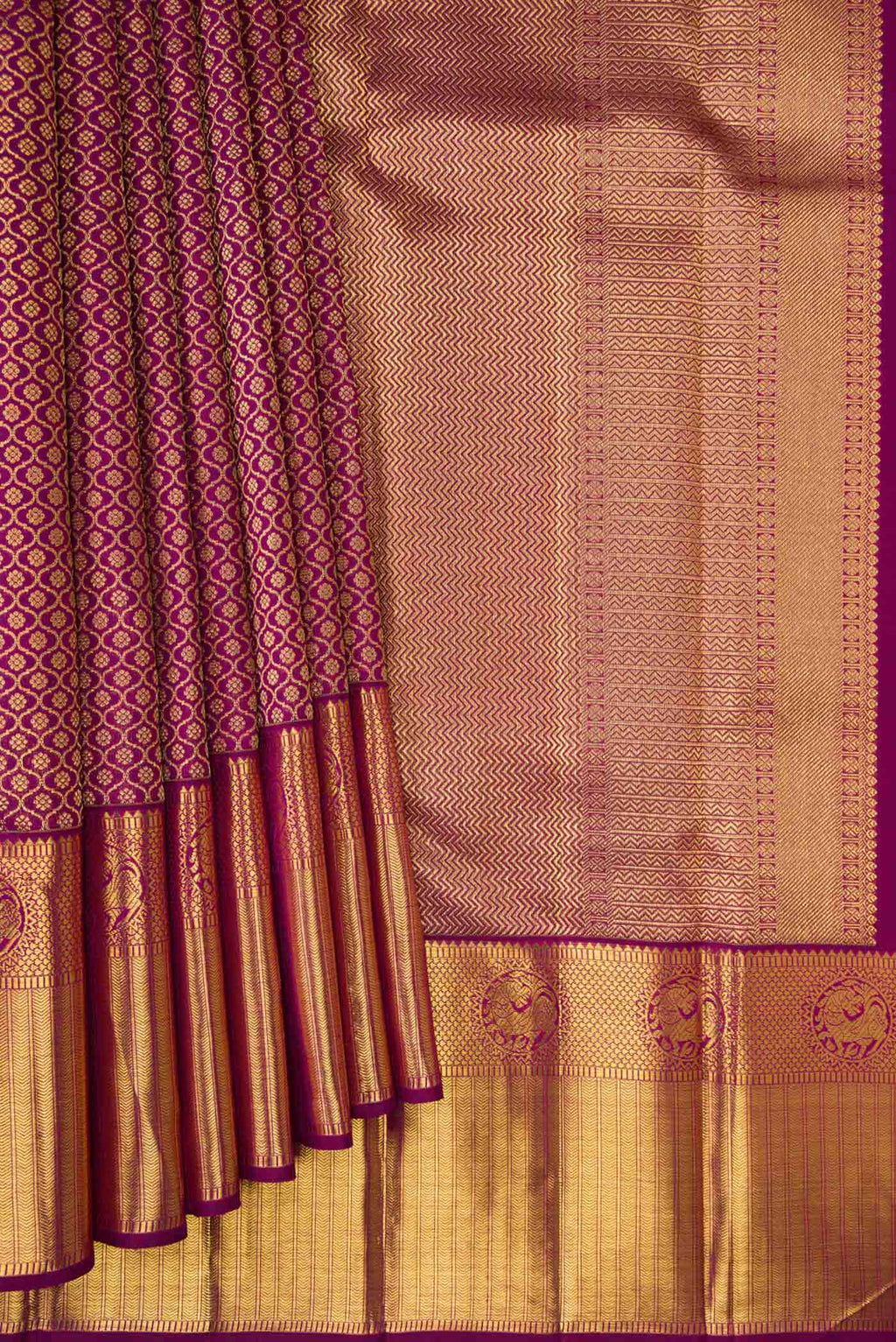 Pleats and pallu of Pure Silk Pure Zari Purple Dual Tone Kanjivaram Tissue Saree with Zari Brocade on the body and Zari Border. 