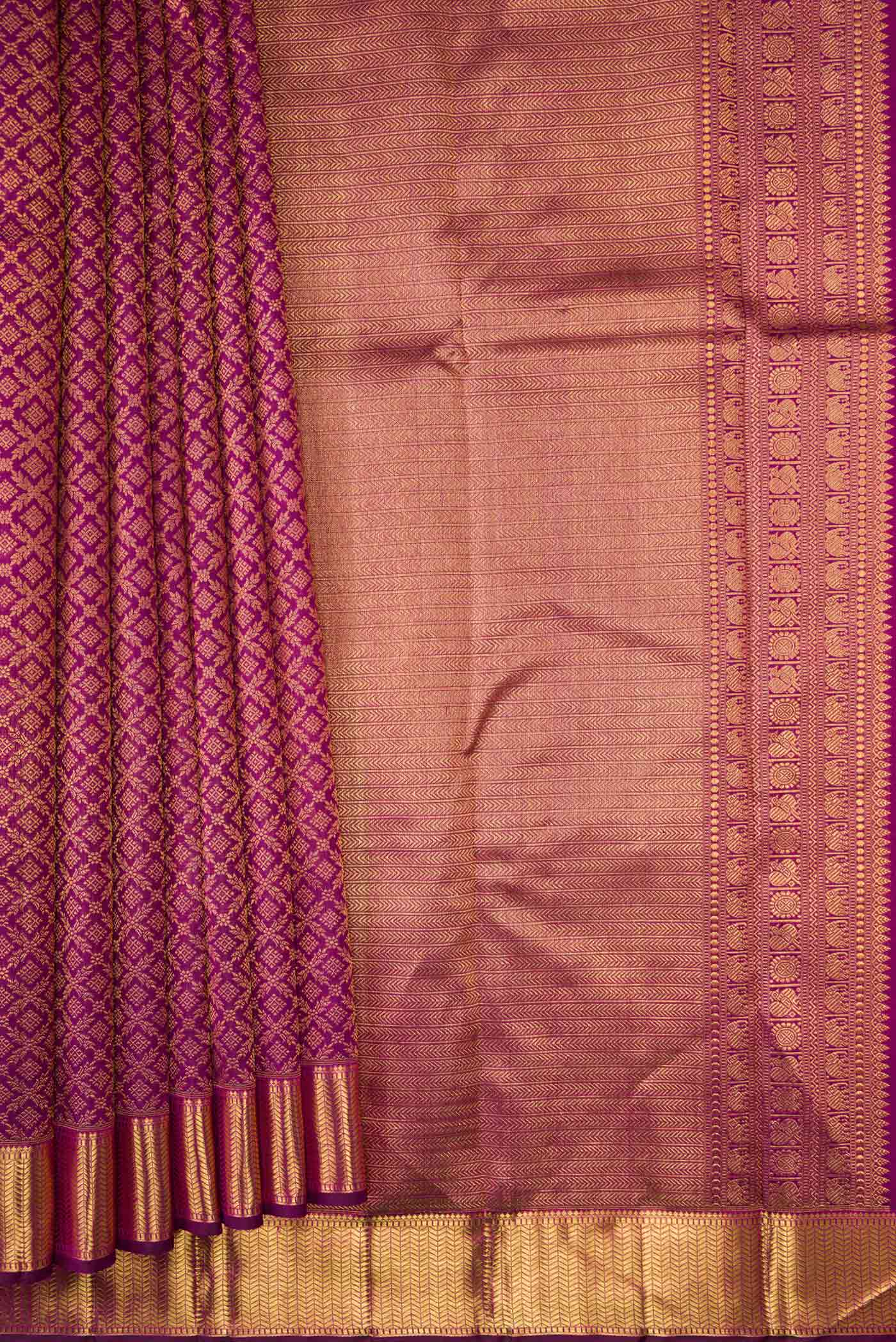Pleats and pallu of Magenta Dual Tone Kanchipuram Silk Saree with Zari Brocade on the body and Zari Border