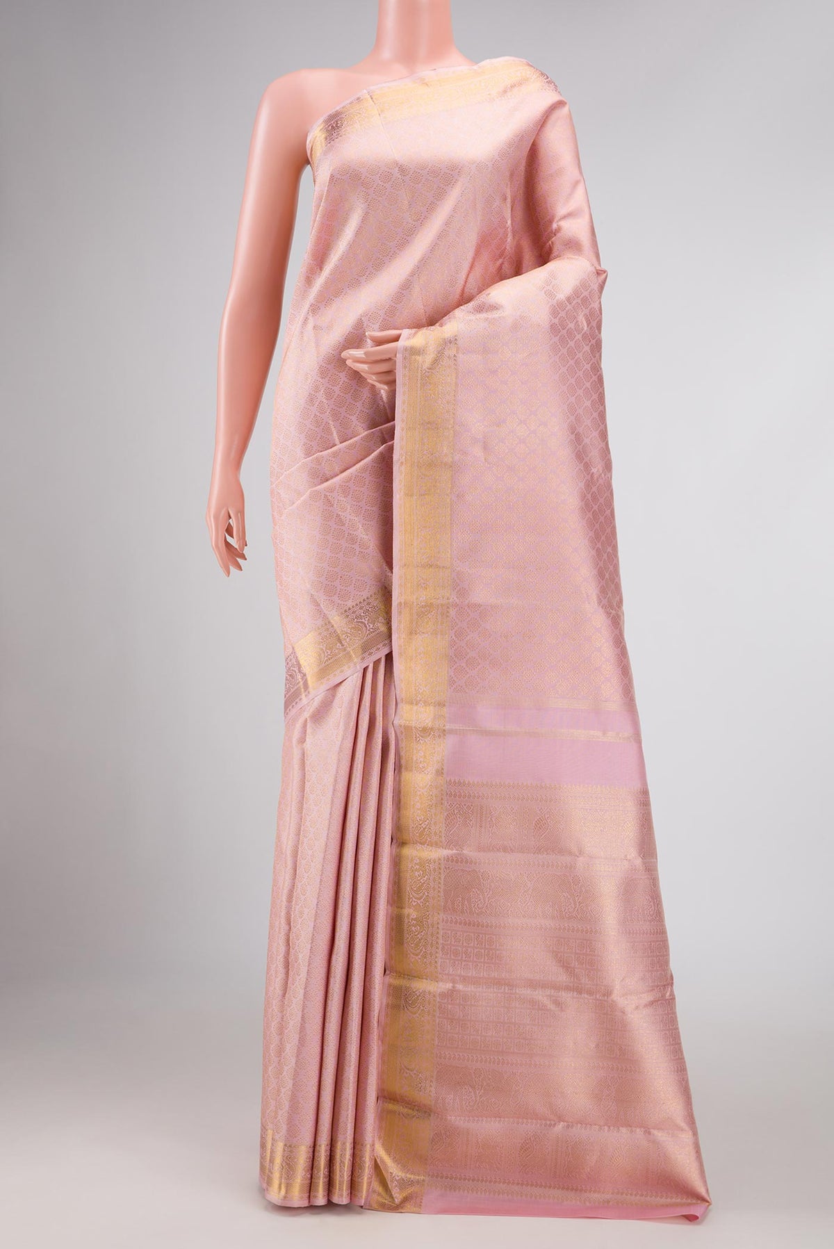 Pure Silk Pure Zari Pink Dual Tone Kanchipuram Saree with Zari Brocade on the body and Zari Border displayed on a mannequin