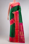 Pure Silk Pure Zari Bottle Green Dual Tone Kanjivaram Saree with Checked design on the body and Zari Border.  displayed on a mannequin