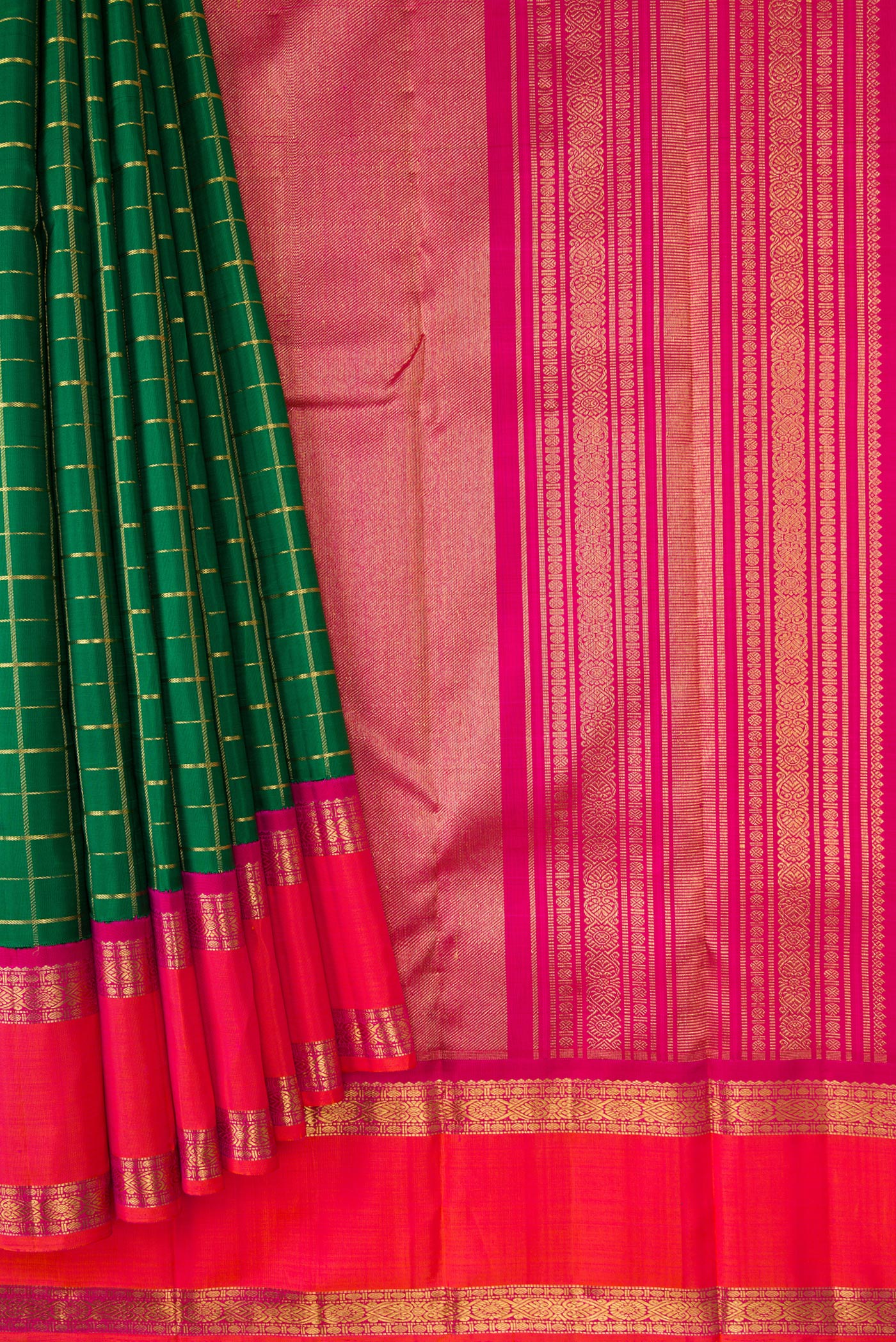 Pleats and pallu of Pure Silk Pure Zari Bottle Green Dual Tone Kanjivaram Saree with Checked design on the body and Zari Border. 