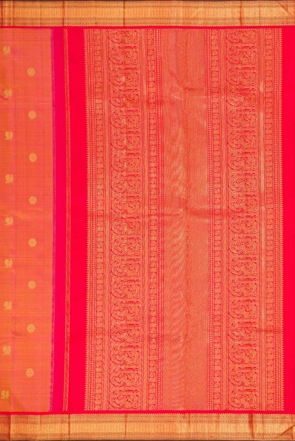 Close up image of the pallu of Pure Silk Pure Zari Rose Gold Dual Tone Kanjivaram Saree with Zari Butta on the body and Zari Border. 