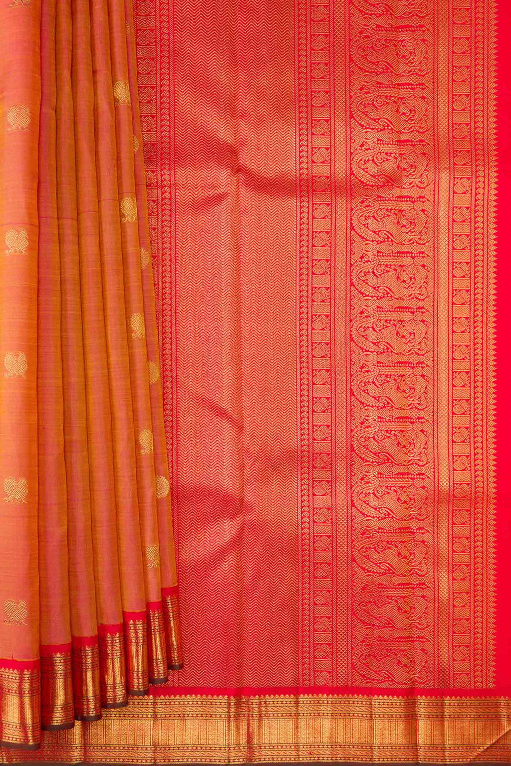 Pleats and pallu of Pure Silk Pure Zari Rose Gold Dual Tone Kanjivaram Saree with Zari Butta on the body and Zari Border. 