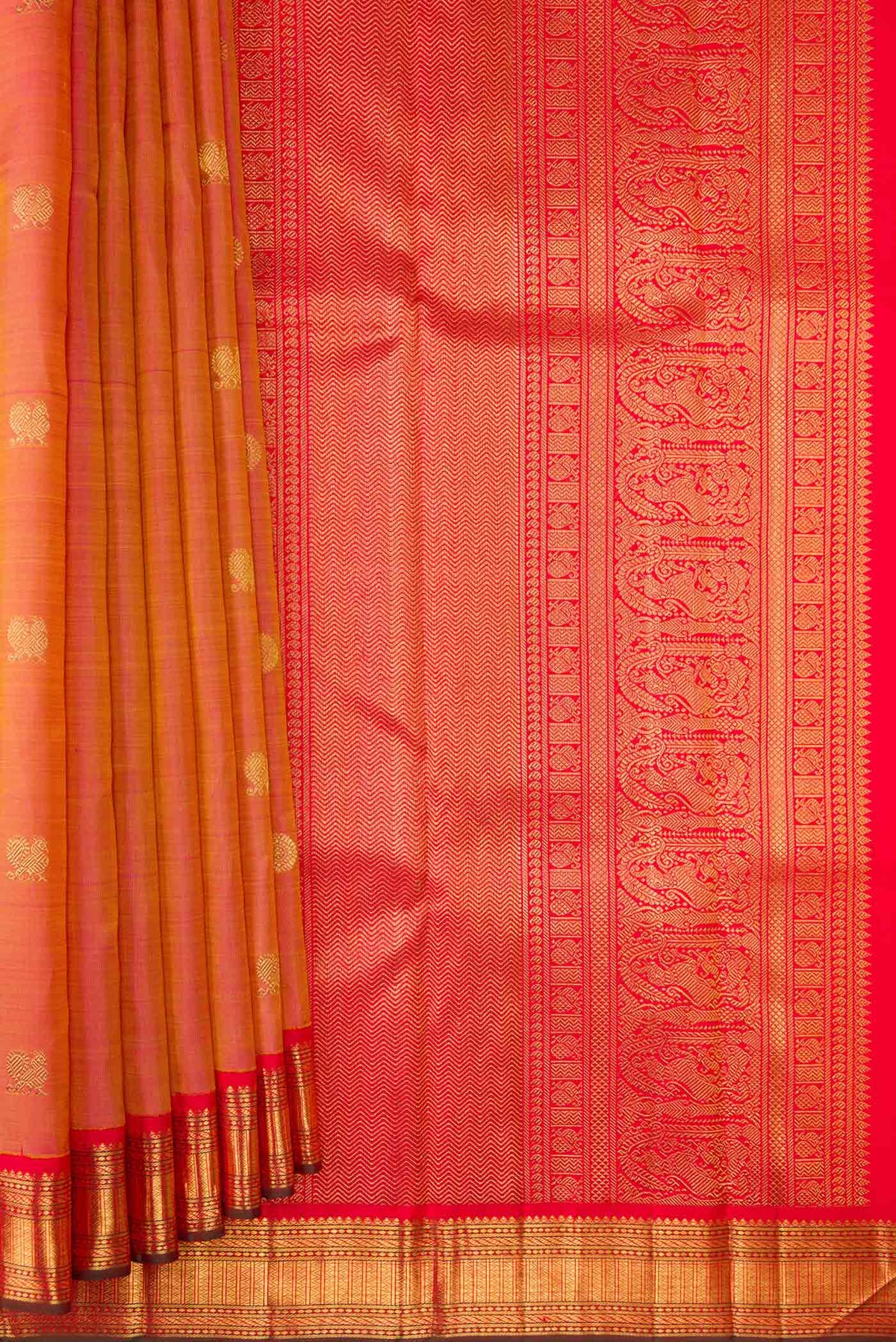 Pleats and pallu of Pure Silk Pure Zari Rose Gold Dual Tone Kanjivaram Saree with Zari Butta on the body and Zari Border. 