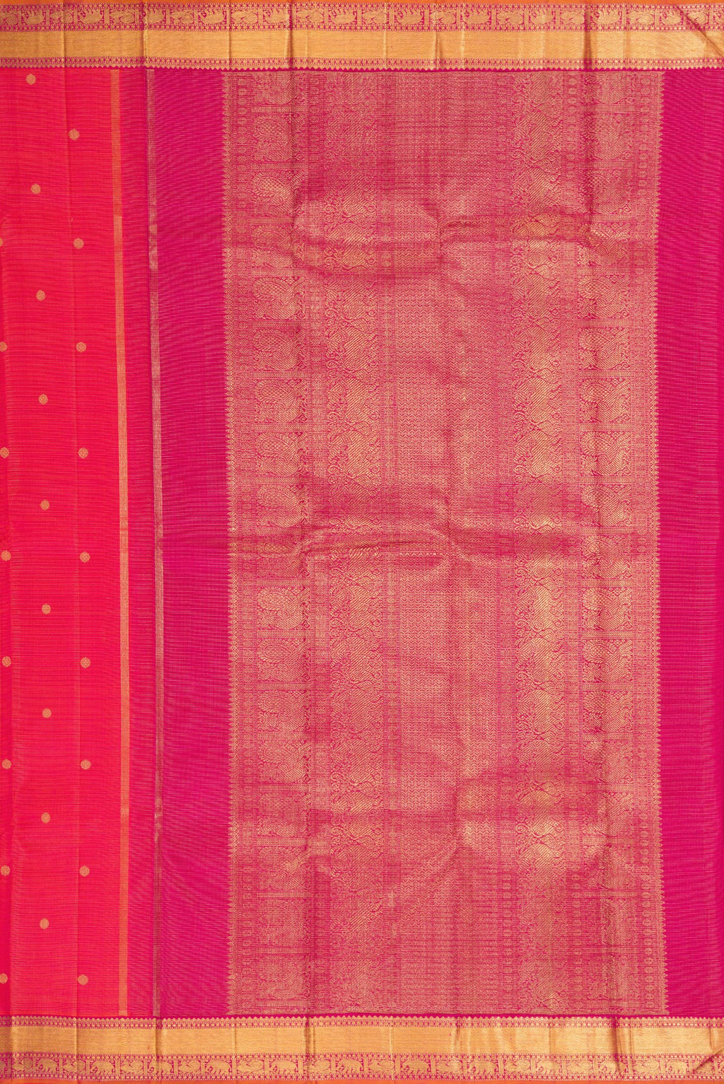 Close up image of the pallu of Coral Dual Tone Kanjivaram Silk Saree with Zari Butta on the body and Zari Border. 