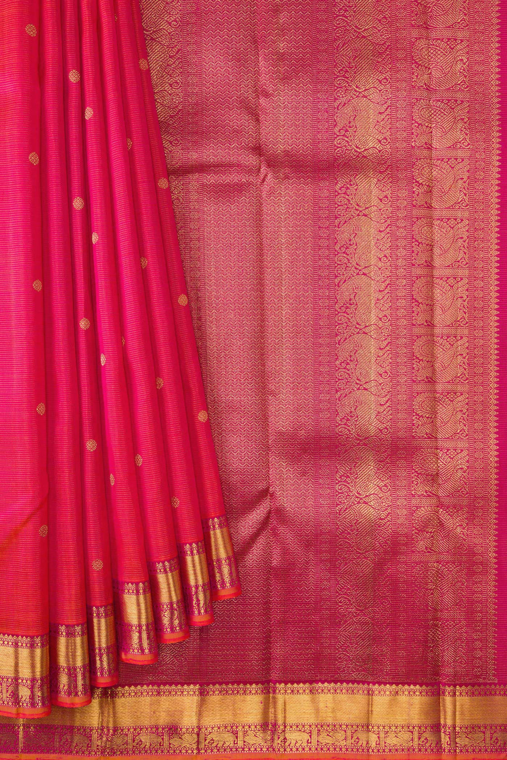 Pleats and pallu of Coral Dual Tone Kanjivaram Silk Saree with Zari Butta on the body and Zari Border. 