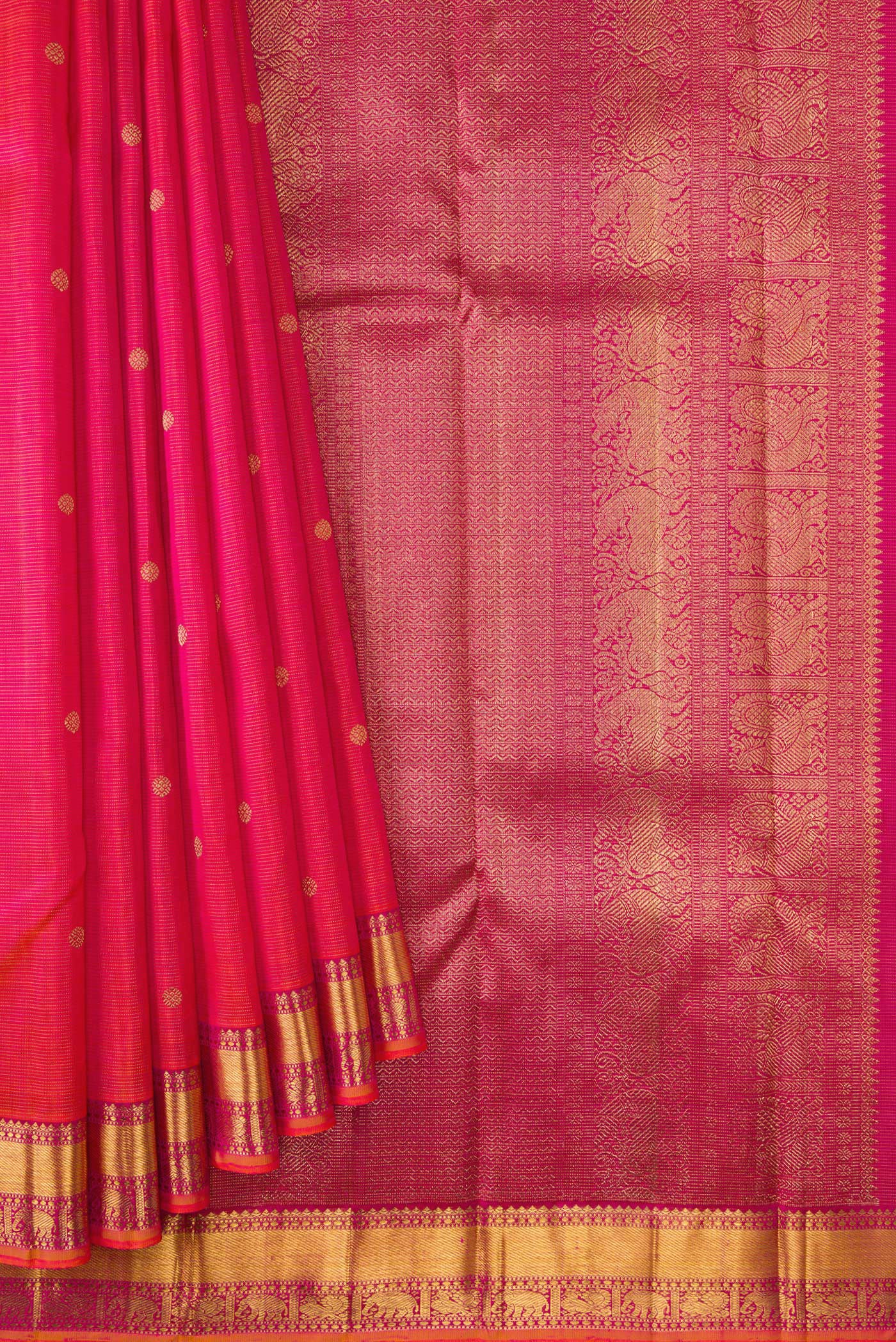 Pleats and pallu of Coral Dual Tone Kanjivaram Silk Saree with Zari Butta on the body and Zari Border. 