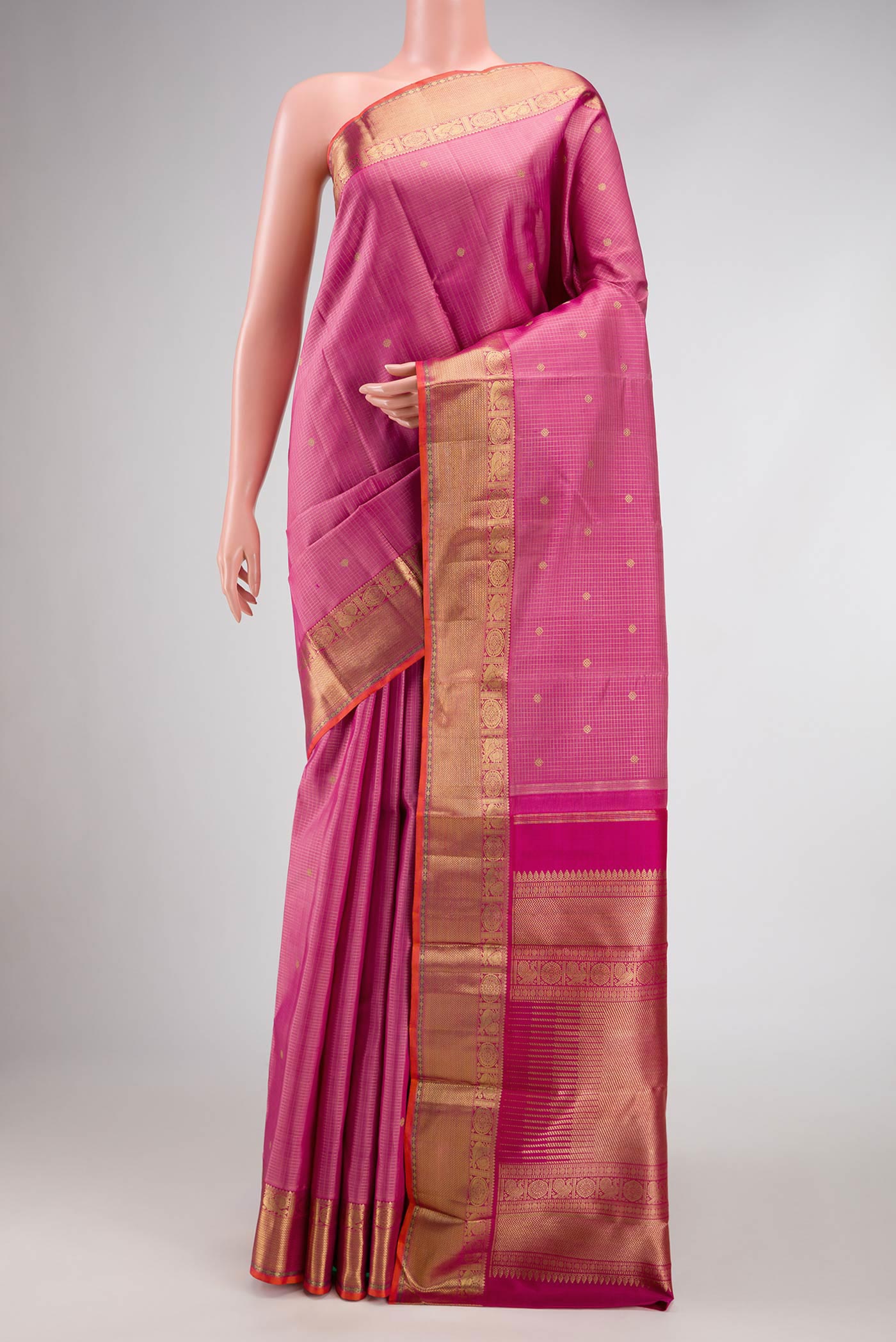 Pure Silk Pure Zari Pink Dual Tone Kanjivaram Saree with Checked design on the body and Zari Border.  displayed on a mannequin