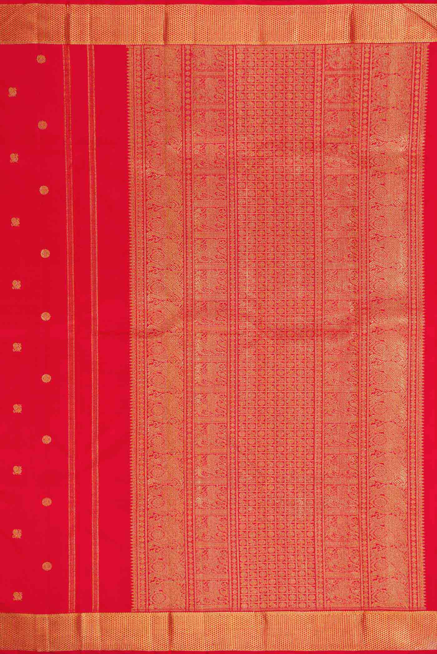 Close up image of the pallu of Pure Silk Pure Zari Red Dual Tone Kanchipuram Saree with Zari Butta on the body and Zari Border. 