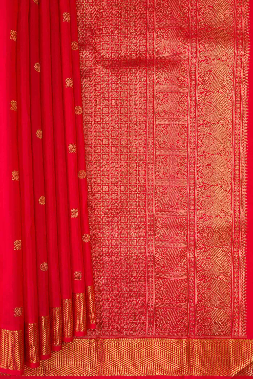 Pleats and pallu of Pure Silk Pure Zari Red Dual Tone Kanchipuram Saree with Zari Butta on the body and Zari Border. 