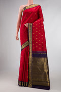 Pure Silk Pure Zari Red Dual Tone Kanchipuram Saree with Zari Butta on the body and Zari Border displayed on a mannequin