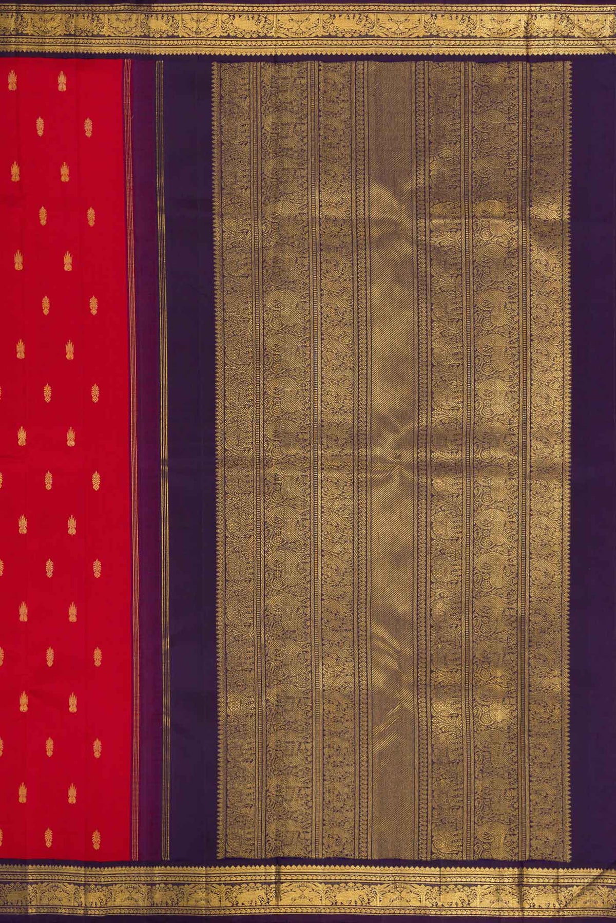 Close up image of the pallu of Pure Silk Pure Zari Red Dual Tone Kanchipuram Saree with Zari Butta on the body and Zari Border