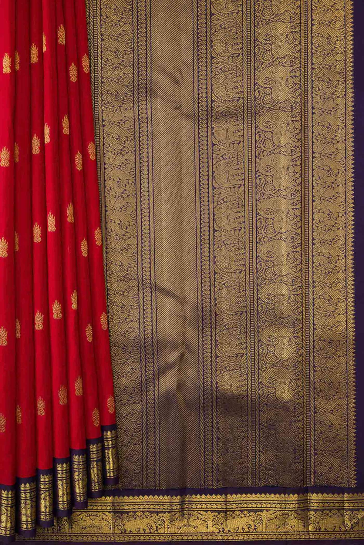 Pleats and pallu of Pure Silk Pure Zari Red Dual Tone Kanchipuram Saree with Zari Butta on the body and Zari Border