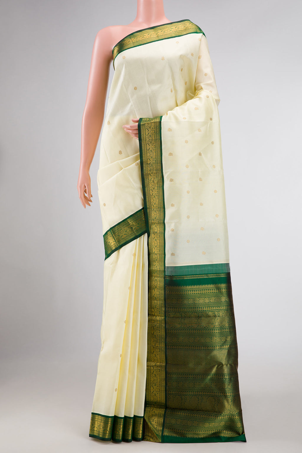 Sandal Dual Tone Kanchipuram Silk Saree with Zari Butta on the body and Zari Border displayed on a mannequin