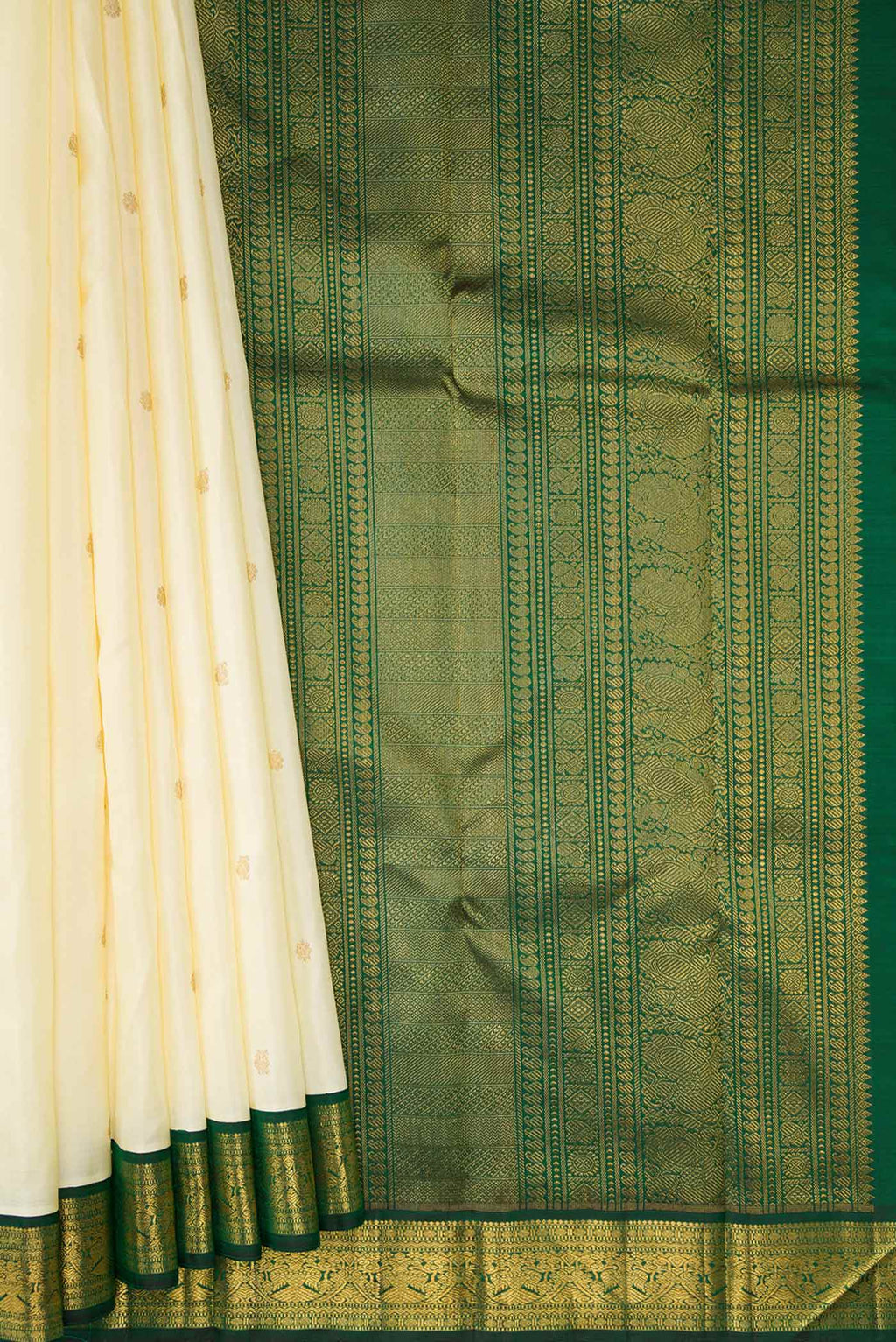 Pleats and pallu of Sandal Dual Tone Kanchipuram Silk Saree with Zari Butta on the body and Zari Border