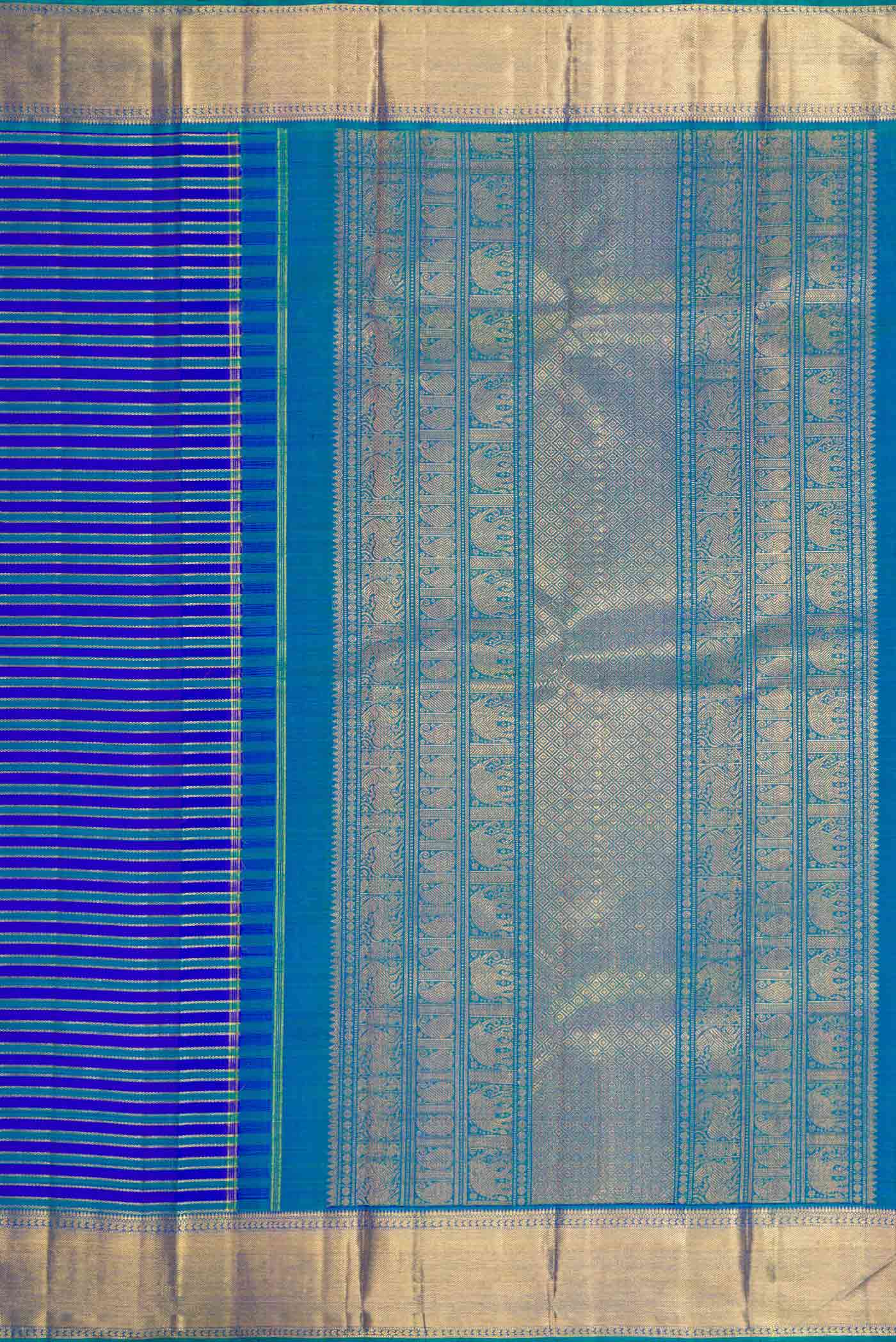 Close up image of the pallu of Pure Silk Pure Zari Royal Blue Dual Tone Kanchipuram Saree with Stripes on the body and Zari Border