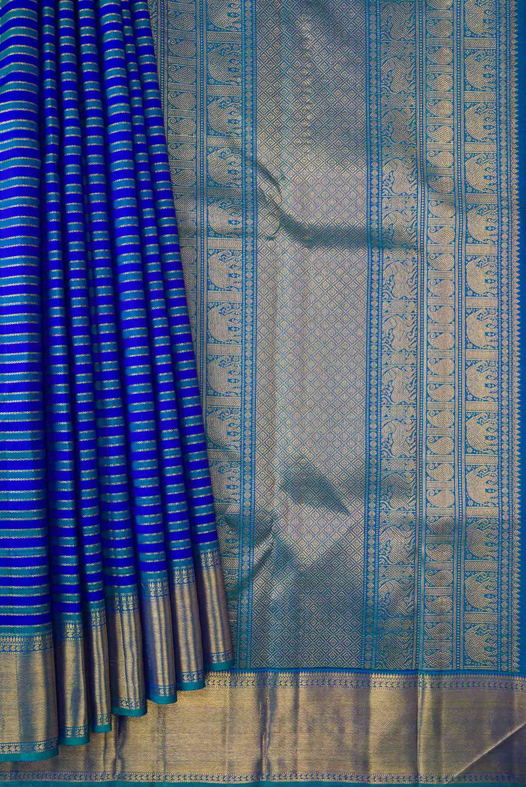 Pleats and pallu of Pure Silk Pure Zari Royal Blue Dual Tone Kanchipuram Saree with Stripes on the body and Zari Border