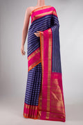Pure Silk Pure Zari Blue Dual Tone Kanchipuram Saree with Stripes on the body and Zari Border displayed on a mannequin