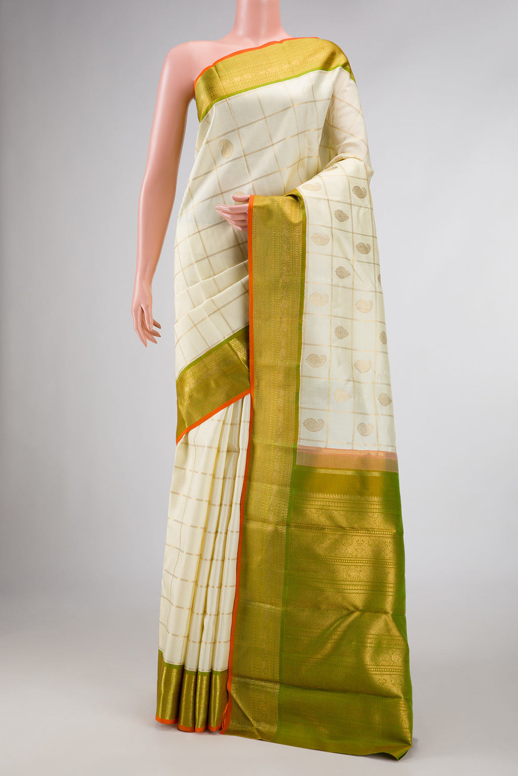 Pure Silk Pure Zari Sandal Dual Tone Kanchipuram Saree with Checked design on the body and Zari Border displayed on a mannequin