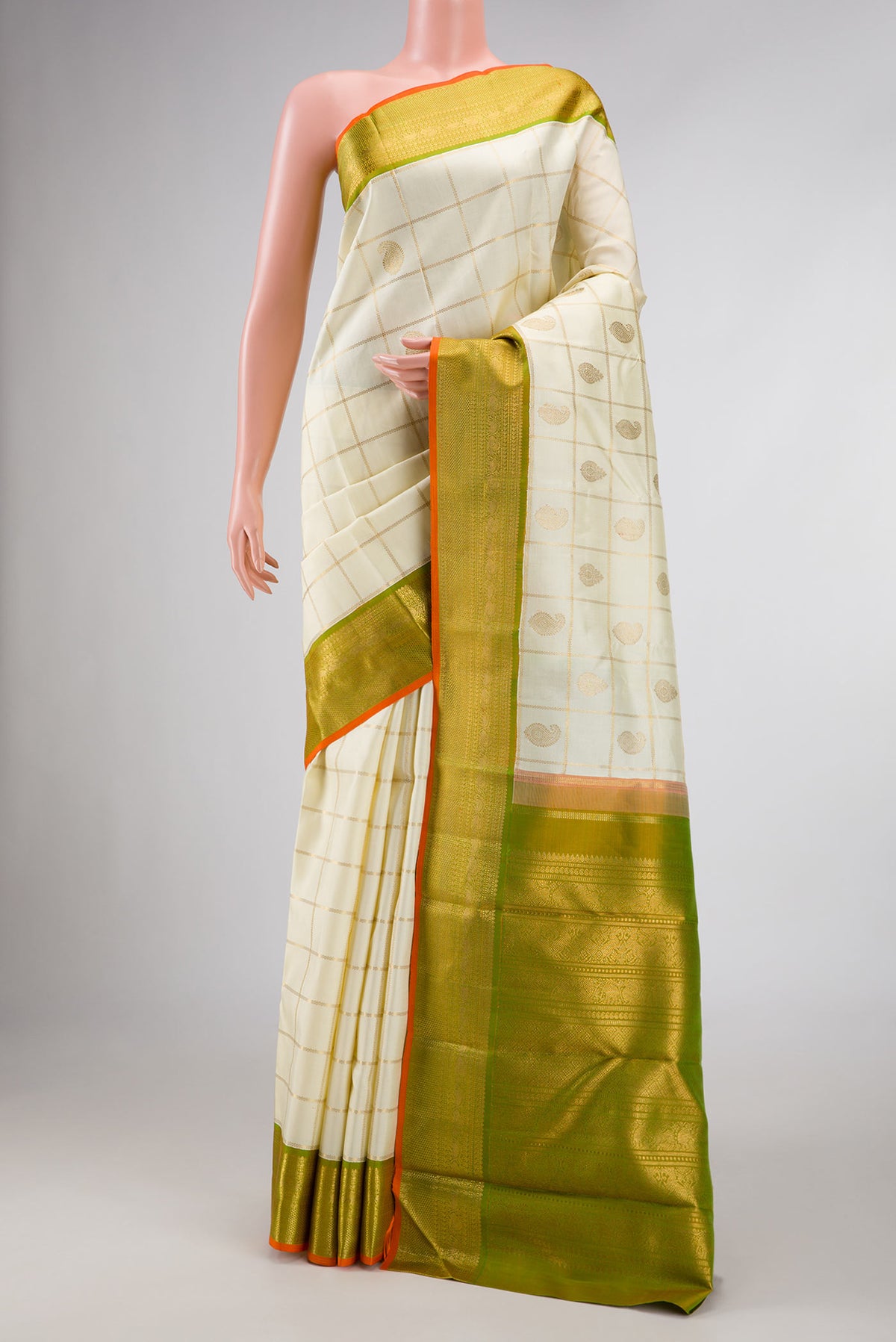 Pure Silk Pure Zari Sandal Dual Tone Kanchipuram Saree with Checked design on the body and Zari Border displayed on a mannequin