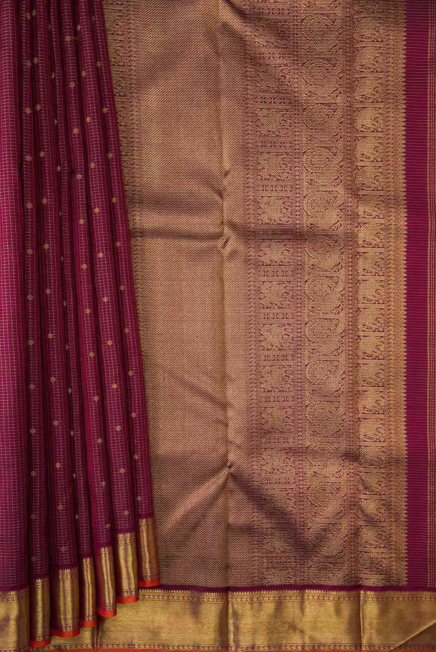 Pleats and pallu of Pure Silk Pure Zari Maroon Dual Tone Kanchipuram Saree with Zari Butta on the body and Zari Border