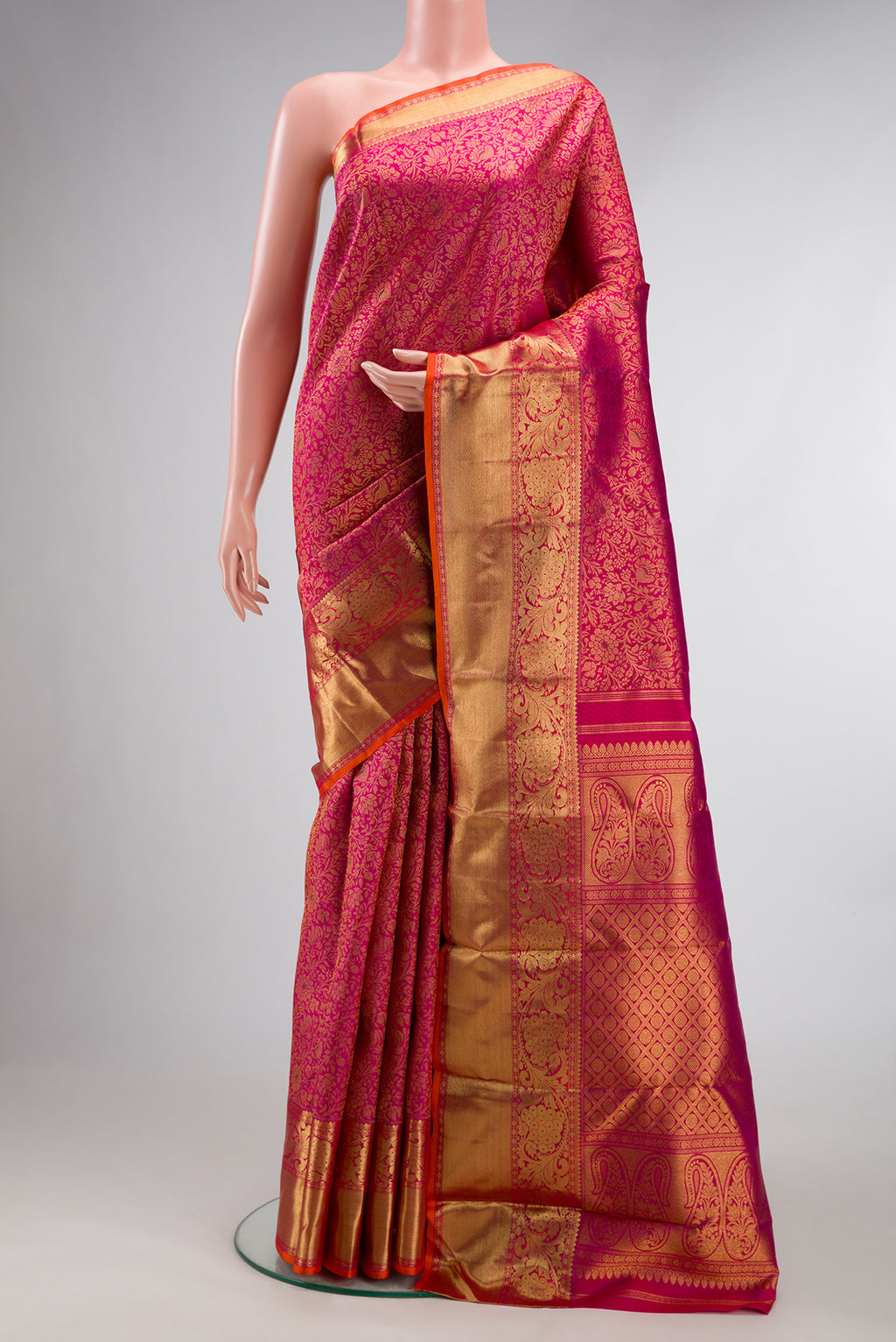 Pure Silk Pure Zari Pink Dual Tone Kanjivaram Saree with Zari Brocade on the body and Zari Border.  displayed on a mannequin