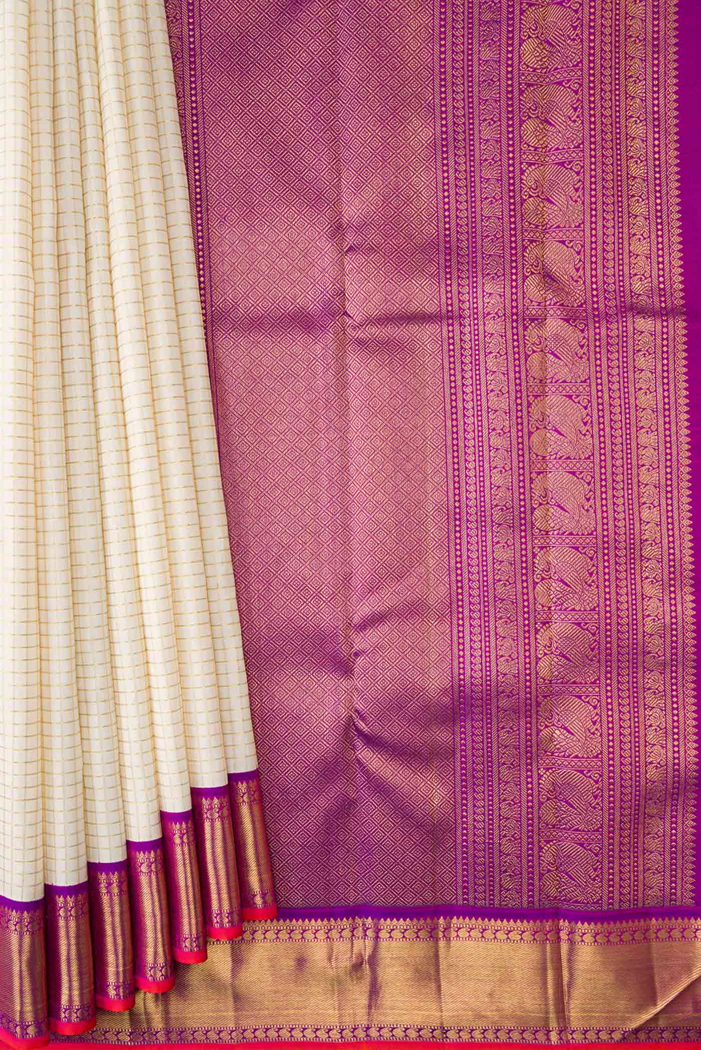 Pleats and pallu of Pure Silk Pure Zari Off White Dual Tone Kanchipuram Saree with Checked design on the body and Zari Border