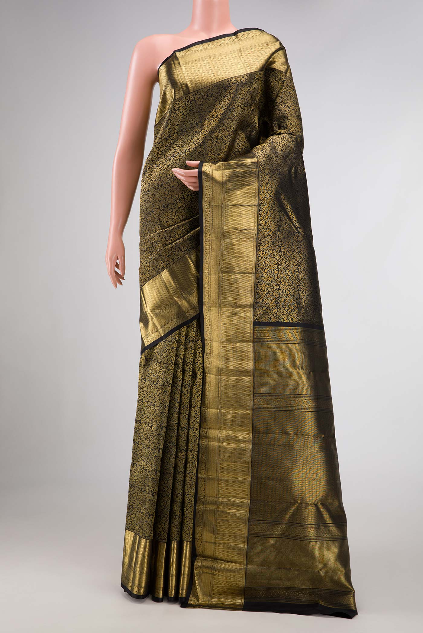 Pure Silk Pure Zari Black Dual Tone Kanjivaram Tissue Saree with Zari Brocade on the body and Zari Border.  displayed on a mannequin