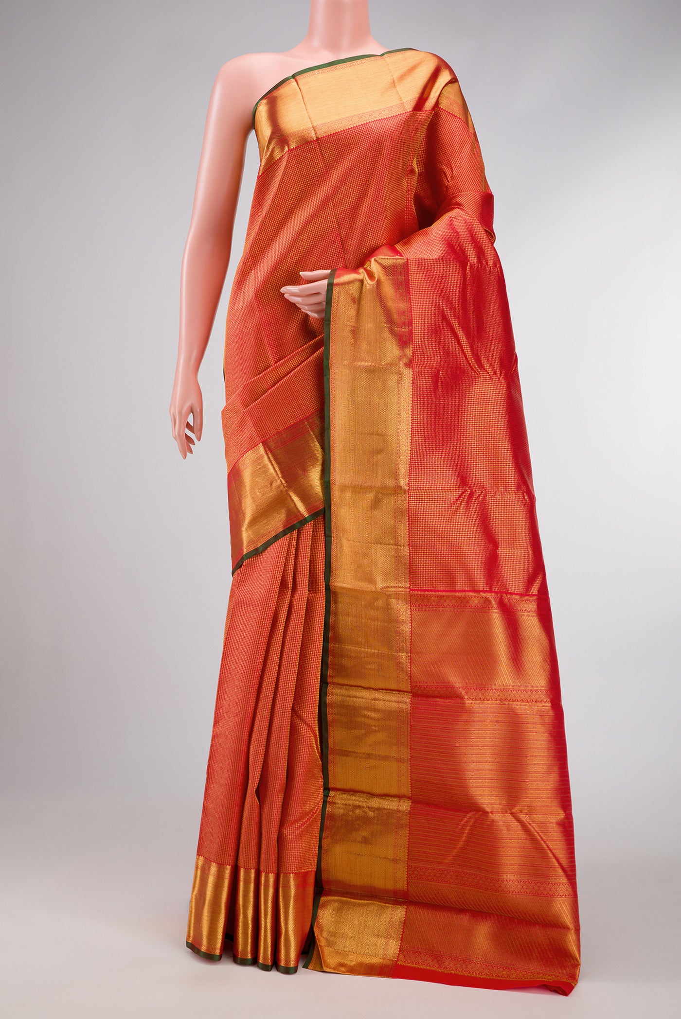 Dark Pink Dual Tone Kanchipuram Silk Saree with Zari Brocade on the body and Zari Border.  displayed on a mannequin