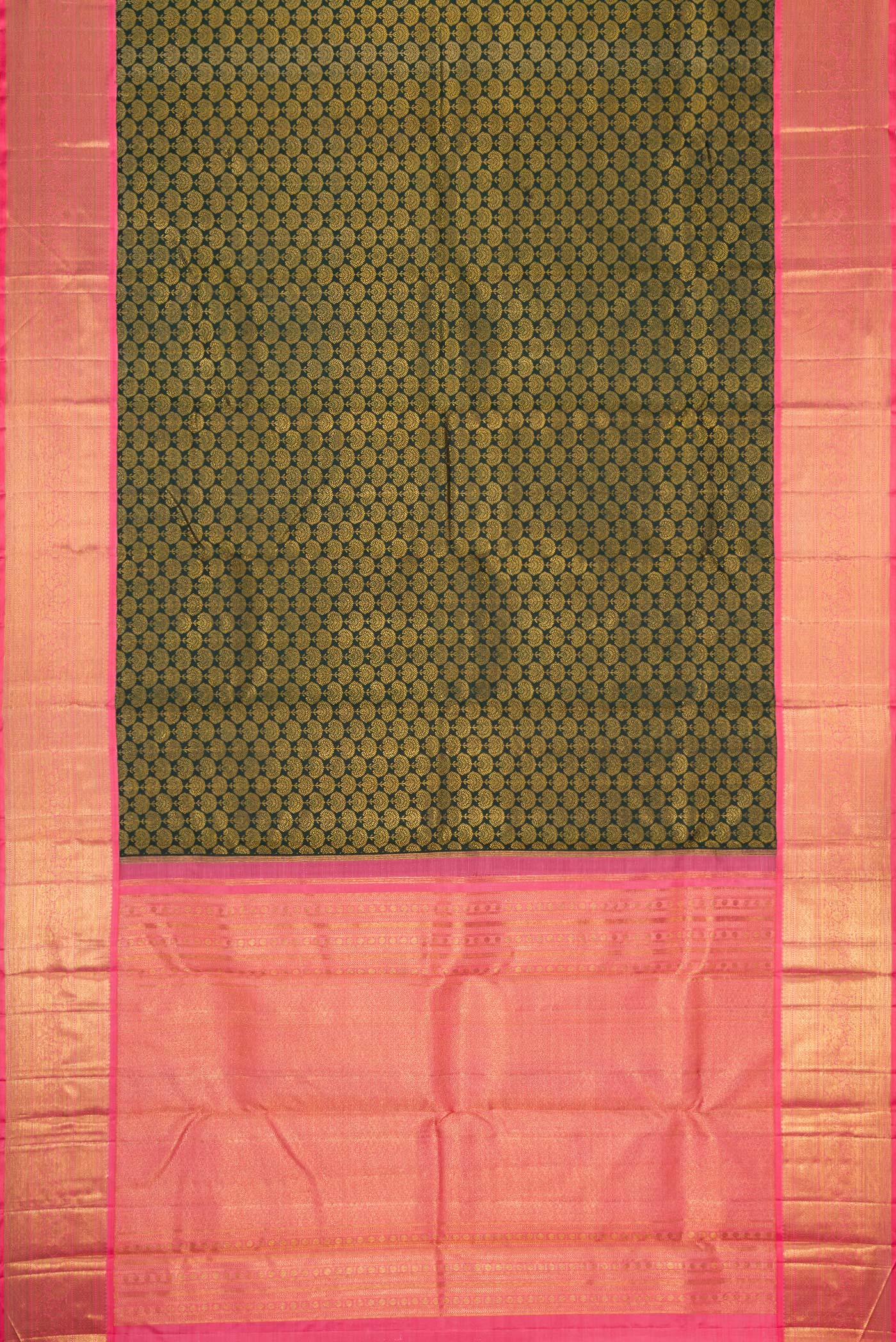 Flat view of Bottle Green Dual Tone Kanjivaram Silk Saree with Zari Brocade on the body and Zari Border. 