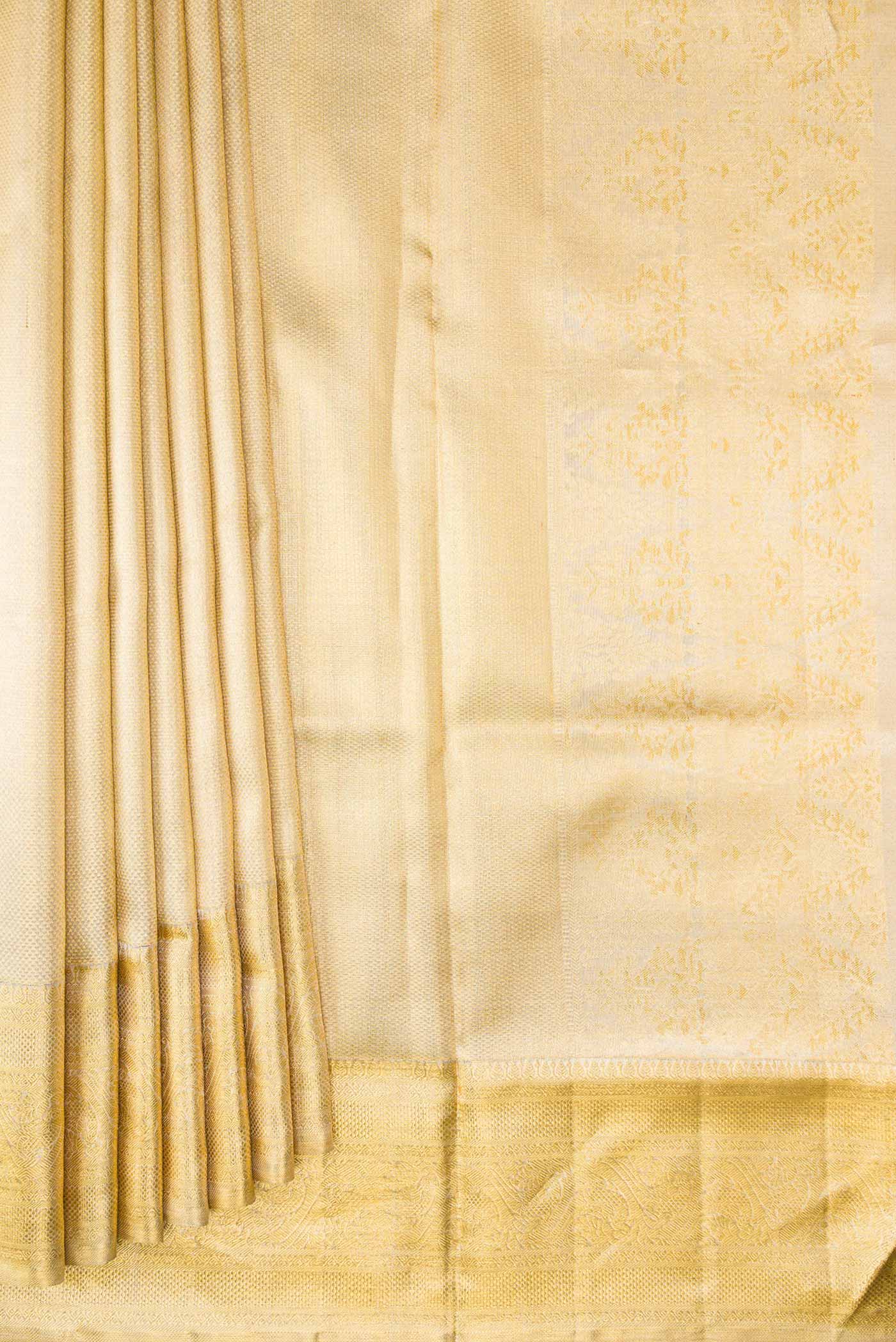 Pleats and pallu of Gold Dual Tone Kanjivaram Tissue Silk Saree with Zari Brocade on the body and Zari Border. 
