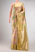 Gold, Sea Green, Pink and Purple Color Kanjivaram Tissue Silk Saree with Zari Brocade on the body and Zari Border.  displayed on a mannequin