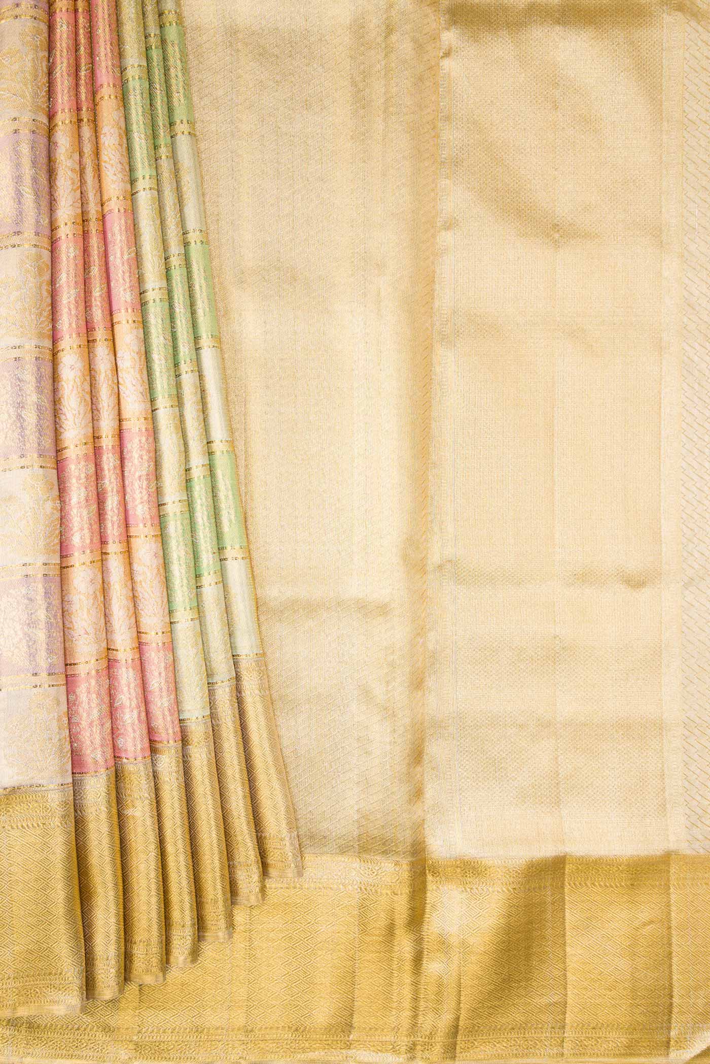 Pleats and pallu of Gold, Sea Green, Pink and Purple Color Kanjivaram Tissue Silk Saree with Zari Brocade on the body and Zari Border. 