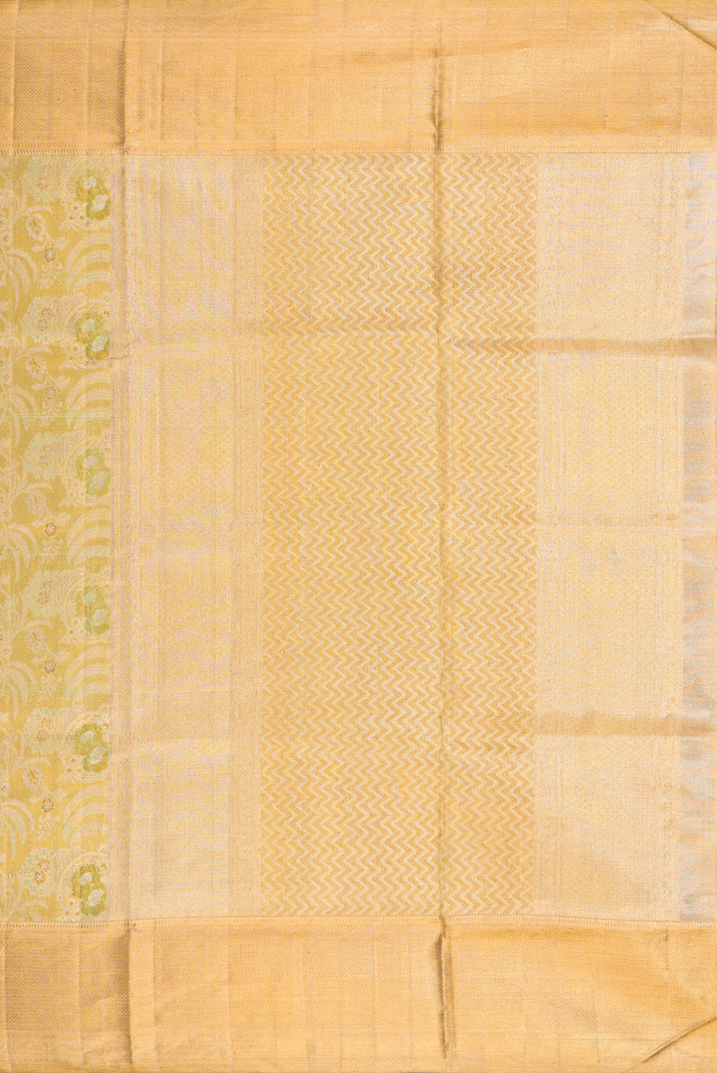 Close up image of the pallu of Pista Green Dual Tone Kanjivaram Tissue Silk Saree with Zari Brocade on the body and Zari Border. 