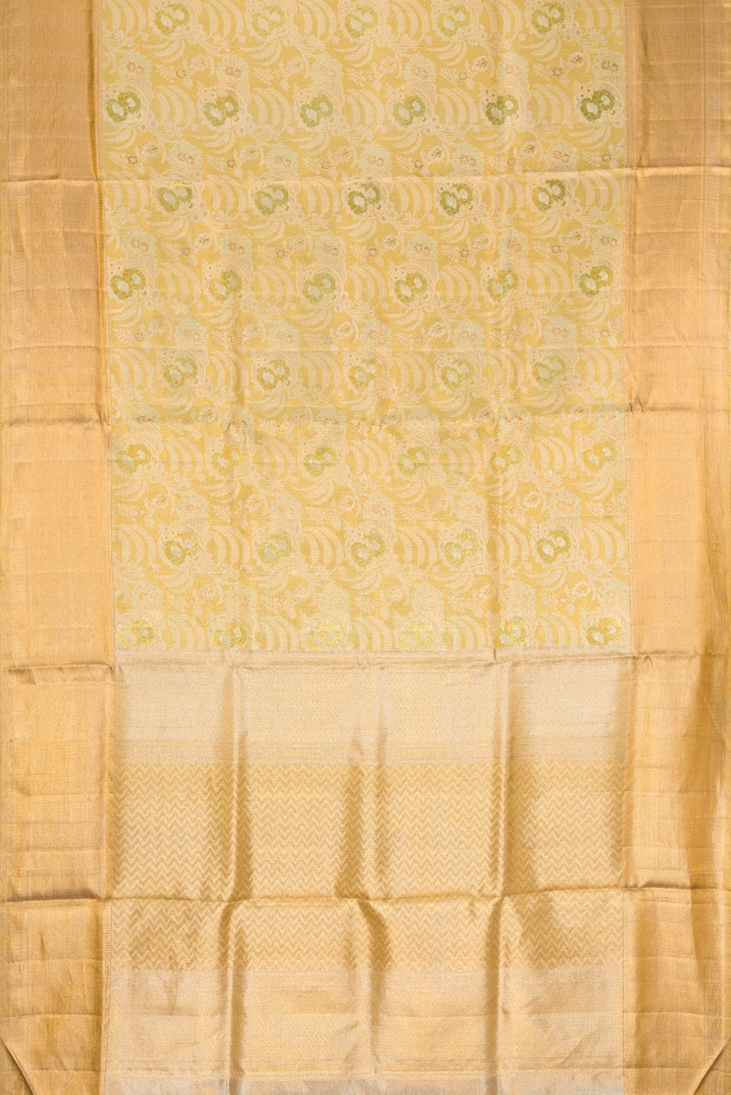 Flat view of Pista Green Dual Tone Kanjivaram Tissue Silk Saree with Zari Brocade on the body and Zari Border. 