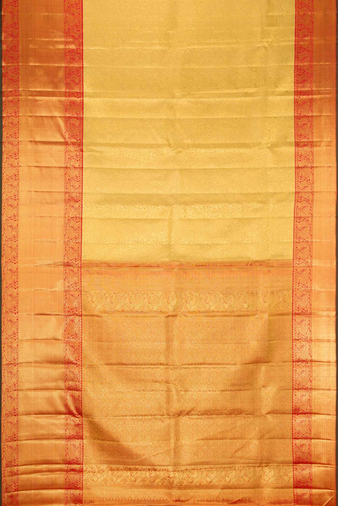 Flat view of Pure Silk Pure Zari Gold Dual Tone Kanjivaram Tissue Saree with Zari Brocade on the body and Zari Border. 