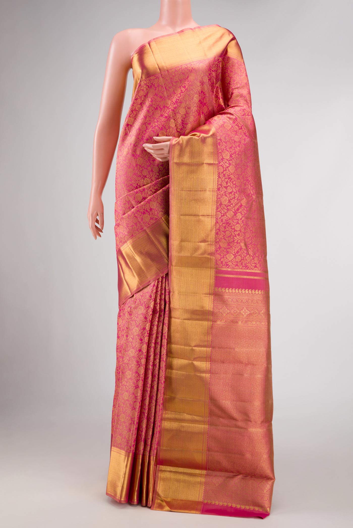 Pure Silk Pure Zari Pink Dual Tone Kanchipuram Saree with Zari Brocade on the body and Zari Border displayed on a mannequin