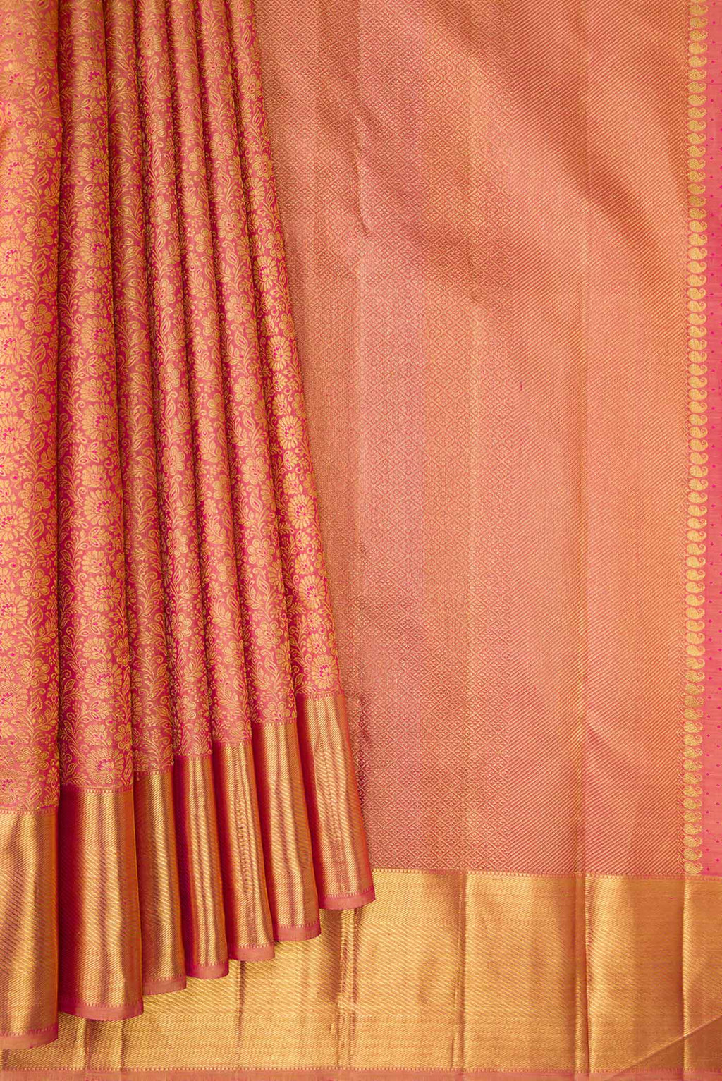 Pleats and pallu of Pure Silk Pure Zari Coral Kanchipuram Saree with Zari Brocade on the body and Zari Border
