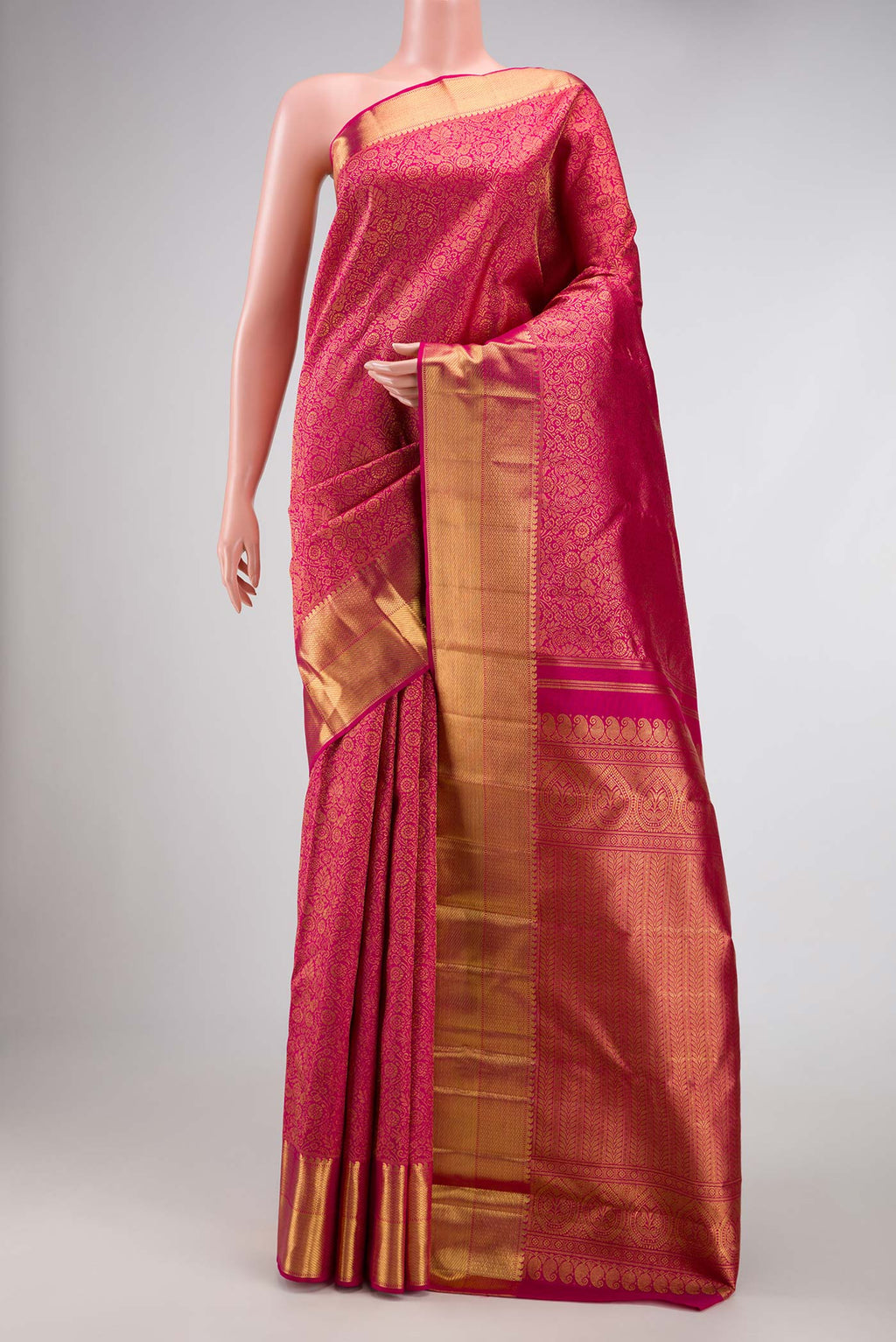 Pure Silk Pure Zari Pink Dual Tone Kanchipuram Saree with Zari Brocade on the body and Zari Border displayed on a mannequin