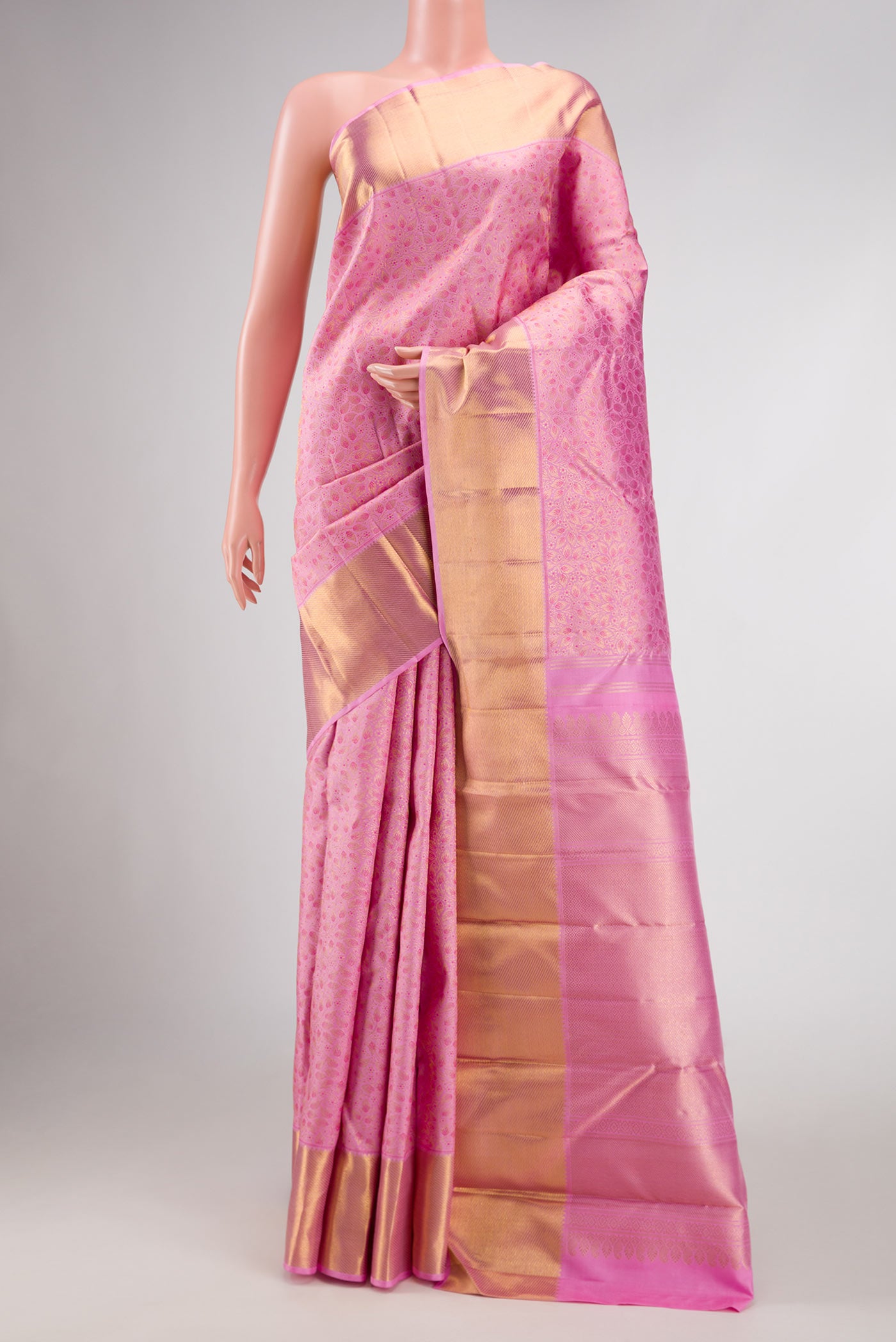 Pure Silk Pure Zari Pink Dual Tone Kanchipuram Saree with Zari Brocade on the body and Zari Border displayed on a mannequin