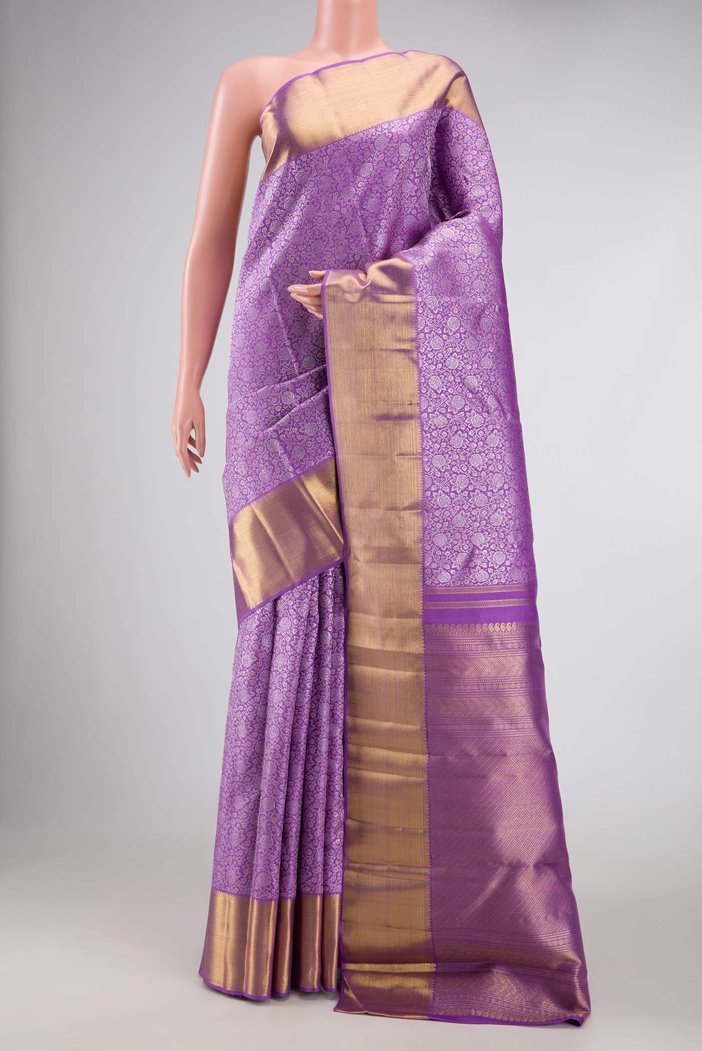 Pure Silk Pure Zari Lavender Dual Tone Kanchipuram Saree with Zari Brocade on the body and Zari Border displayed on a mannequin