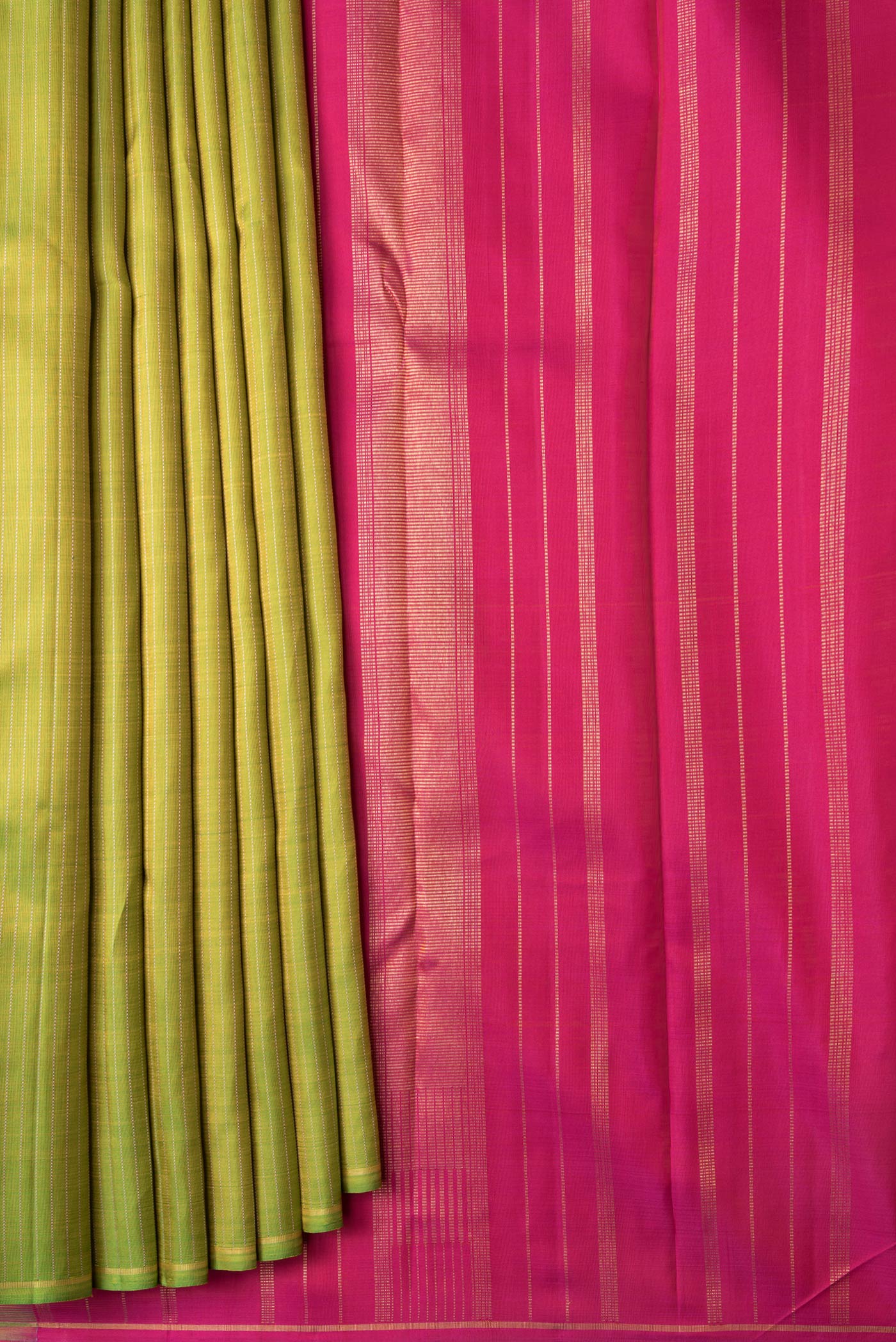Pleats and pallu of Parrot Green Dual Tone Kanjivaram Silk Saree with Stripes on the body and Thin Zari Line. 