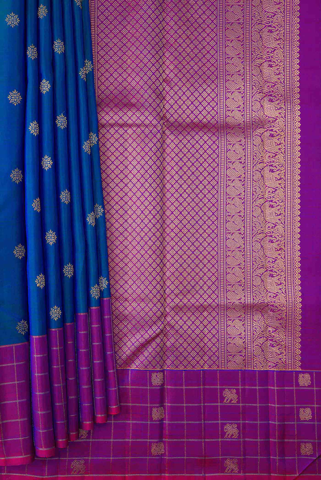 Pleats and pallu of Pure Silk Pure Zari Peacock Blue Dual Tone Kanchipuram Saree with Zari Butta on the body and Zari Border
