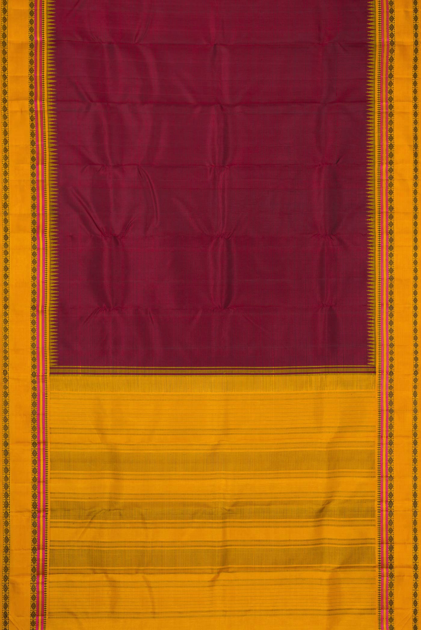 Flat view of Maroon Dual Tone Kanjivaram Silk Saree with Plain Body and Thread Border. 